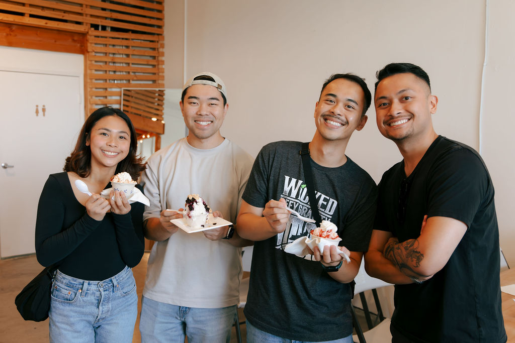 Friends enjoying shave ice at an event